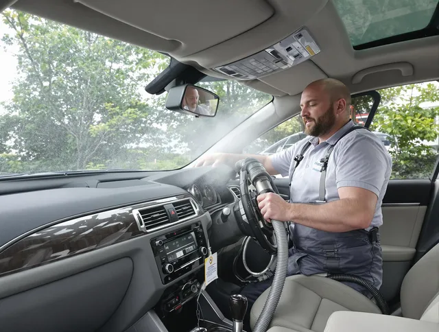 Abington Air Duct Cleaning specialist performing professional car duct cleaning in Abington