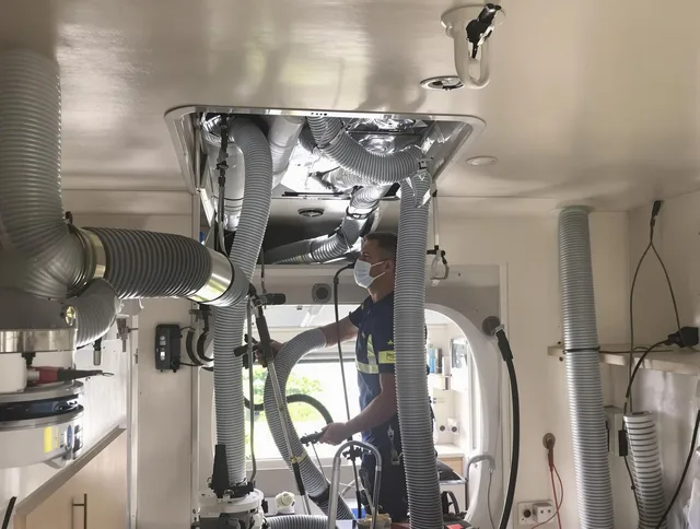 Abington Air Duct Cleaning specialist performing precise mobile home duct cleaning in Abington